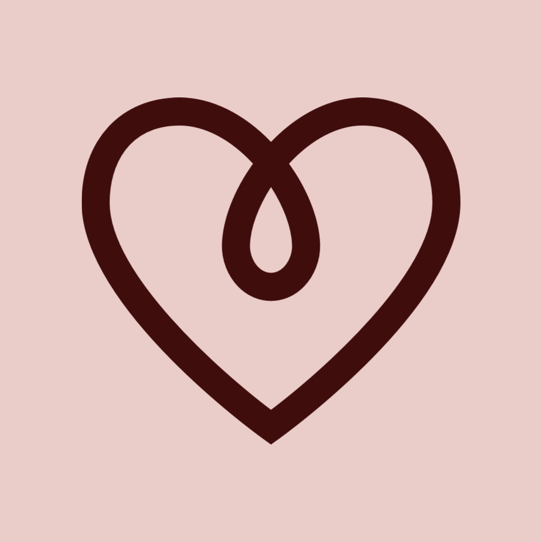 a heart icon on a light pink background